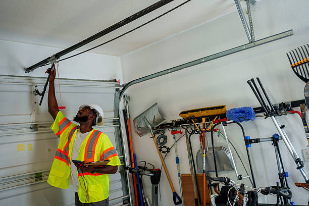 Professional Garage Door Panel Replacement technician working in Roosevelt Gardens, FL